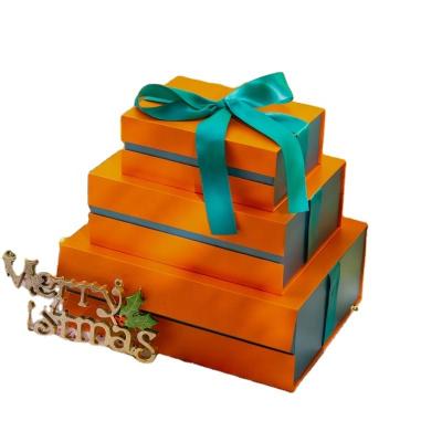 China custom luxury elegant box with ribbon magnet closure type gift packaging box for sale