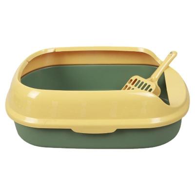 China Sustainable Pet Supplies Semi Closed Litter Basin Cat Toilet To Send Litter Shovel Splash Proof Oval Litter Basin for sale