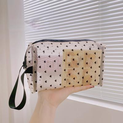 China Net simple cosmetic large capacity storage bag love large capacity identification wire storage portable cosmetic bag for sale