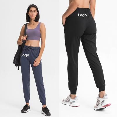 China Yoga High Jogging Sports Pants Yoga Leggings Pants Women Pocket Waist Hose DP022 Breathable Side Sports Jogger Gaiters Yoga Pants for sale