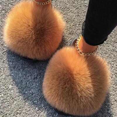 China Wholesale Luxury Indoor Fluffy Indoor Ladies Fluffy Slippers Fashion Trend Women Soft Comfortable Fur Slides for sale