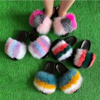 China Breathable Durable In Use Fur Slides 2020 Black Fur Slippers Pompom Fur Slides for sale