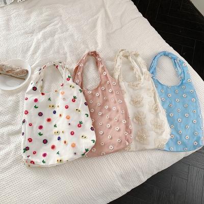 China Newest Newest Small Daisies Waterproof Fancy Fashionable Organza Fresh Soft Tote Embroidered Handbags For Women Shopping Bag Hot for sale