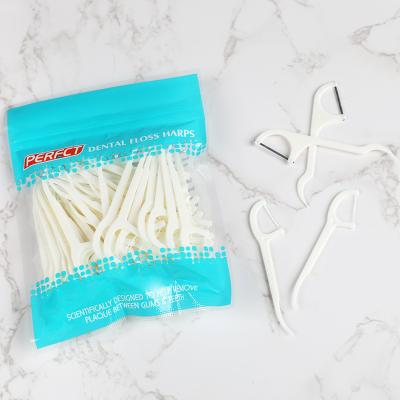 China Hot Selling Eco-friendly 50Pcs PP PERFCT Oral Care Biodegradable Bamboo Charcoal OPP Bags Dental Floss Picks for sale