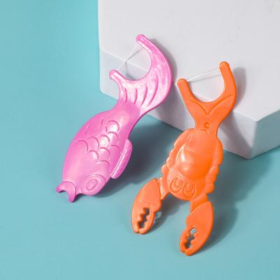 China Wholesale PERFECT Nylon Waxed Kids Dental Flosser with Cartoon Animal Floss Picks for sale