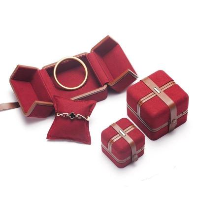 China Ring Bracelet Necklace Earring Jewelery Wholesale Red Leather Bracelet Jewelry Box Pouch Christmas Double Door Pendant Necklace Jewelry Box box for the ring for sale