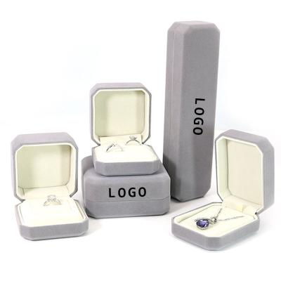 China Custom Ring Bracelet Necklace Earring Jewelry Logo 8 Angle Fiber Velvet Boxes Simple Bracelet Necklace Ring Jewelry Packaging Boxes Pendant With Logo for sale