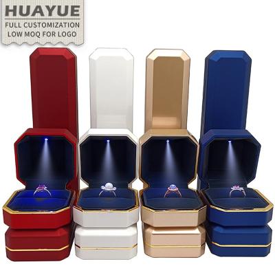 China Ring Bracelet Necklace Earring Jewelry Wholesale Proposal Plastic High End Ring Bracelet Necklace Packaging Golden Octagonal Edge Line Led Jewelry Box With Light for sale