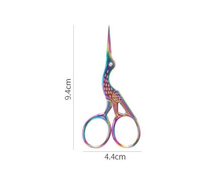 China Retro Crane Scissors Pointed Professional Stainless Steel Nail Convenient Color Titanium Beauty Scissors for sale