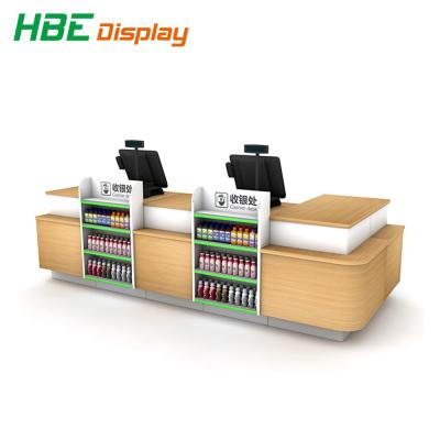 China Durable supermarket checkout maternal convenience and child store corner checkout counter for sale