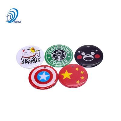 China Waterproof Customized Round Shape Phone UID 13.56 MHz NFC Glue NFC Epoxy Resin Tag for sale