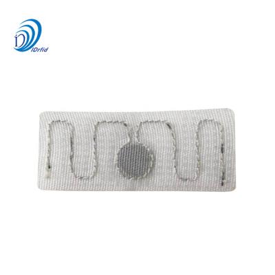 China High Temperature Resistance Waterproof Washable Fabric Label RFID UHF Laundry Tag for sale