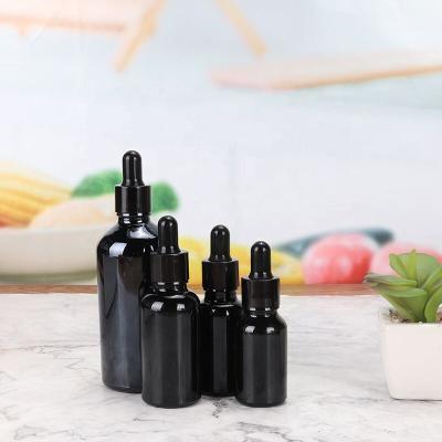 China New Beverage Bottles 2020 5ml 10ml 30ml Black Dropper Bottle Essential Oil Glass Bottle Manufacturers for sale