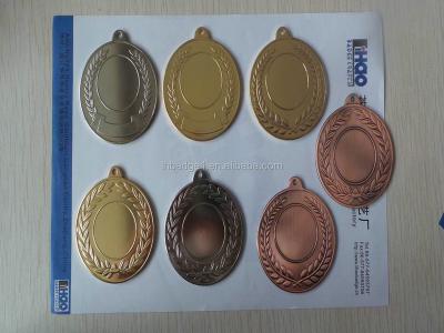 China Europe round gold embossed sport medals and trophies for sale