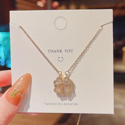 China FASHIONABLE Zircon Celebrity Four Leaf Heart Shape Creative Clavicle Chain Female Micro Folding Inlaid Magnetic Pendant Necklace for sale