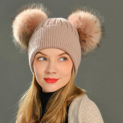 China Real COMMON Raccoon Fur Pompom Hat Women Winter Knitted Fur Pom Pom Beanie Hat Female Two Girls Beanies Skullies Wool Hats for sale