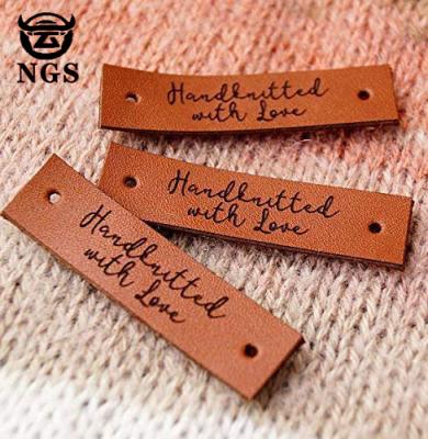 China Sustainable Wholesale Leather Garment Labels In Garment Labels For Denim for sale