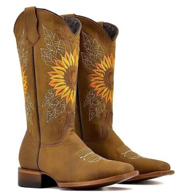 China Quick-drying AliExpress 2022 winter medium tube plus boots size Europe and the United States thick heel led toe sunflower embroidery ride for sale