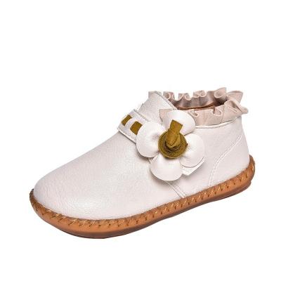 China Autumn Leather Children's Simple Flat-soled Peas Baby Girls' Female Boots Round for sale