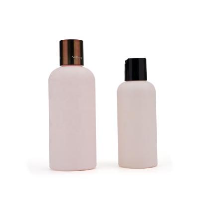 China Pink 150ml 250ml Empty Matte HDPE Body Lotion Plastic Shampoo Simple Design Bottle With Disc Top Cap for sale