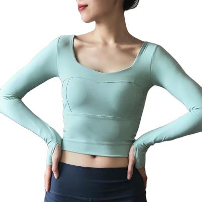 China New QUICK DRY sports tops women's long sleeve diet tights detachable chest pad yoga clothes tops for sale