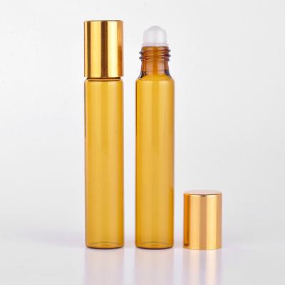 China 10ml  Amber Essential Oil Glass Roll On Bottle With Silver or Gold Cap and Metal Roller for sale