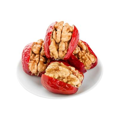 China Nutritious Hot Chinese Delicious Dried Jujube Red Dates With Walnut Meats for sale