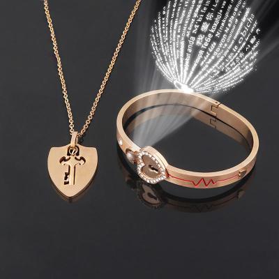 China Romantic Heart Lock Service 100 Languages ​​Projection Love Couples Popular Charms Bracelet for sale