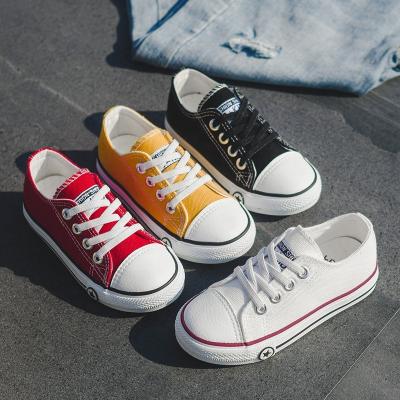 China Children's Casual Canvas Shoes Red Yellow Lace Up Black White Comfortable Children Leisure Flat Cheap Shoes For Boy Girls for sale