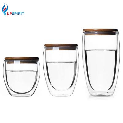 China Sustainable Double Wall Insulated Borosilicate Glass Coffee Mug Set Bamboo Glass Water Bottle for sale