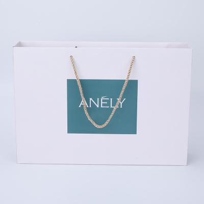 China Recyclable Luxury White Custom Printed Gift Paper Bag Logo Jewelery Packaging Paper Bag Offset Printing Shopping Fashion for sale