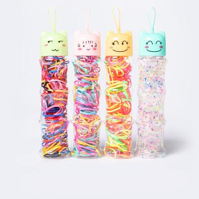 China New Soft Cartoon Bottled Lovely Bottle Elastic Band Small Children Braided High Elasticity Disposable Head Rope for sale