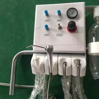 China Unidade dental portátil dental da turbina do compressor de ar de tapeçaria com garrafa de água à venda