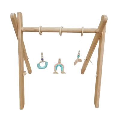 China Toy Eco Friendly Natural Baby Educational Wooden Fitness Frame Toys Play Mat Gym With Hanging Hook Play for sale