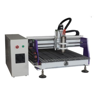 China Working 3 Axis 6090 CNC Router Wood Carving Machine With Water Cooled Spindle for sale