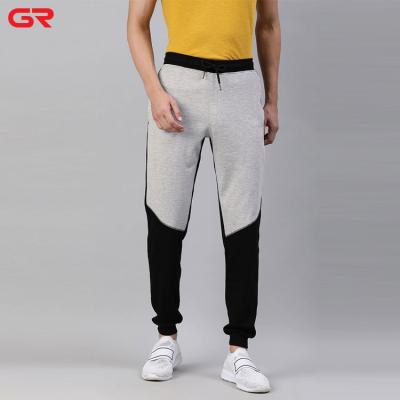 China 2022 New Arrival Anti-Wrinkle Color Blocked Slim Fit Training Embroidery Logo Breathable Jogger Pants Midweight Trousers With Side Pockets for sale