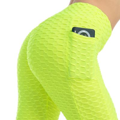 China Sexy Breathable Women Yoga Pants Gaiters Bubble Butt Yoga Cut Lifting Gaiters With Pocket for sale