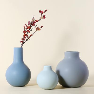 China Europe New Creative Accessories Marcaons Home Table Stone Crafts Ceramic Table Vase for sale