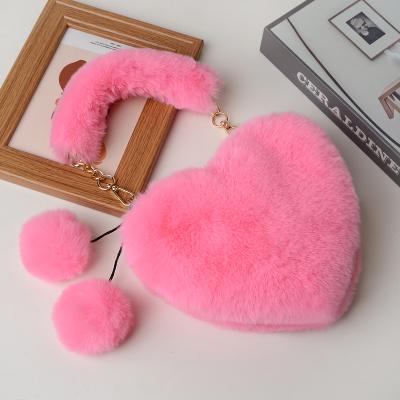 China Fashion\comfortable female bag\goods 2021 popular plush girl handbag gift bag wholesale cute heart-shaped cute faux fur female messenger for sale