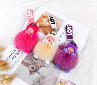 China Real Fox Tassel Lovely Angel Baby Metal Keyrings Handbag Car Fashionable Colorful Acrylic Dangle Fur Rings Gift Key Chain For Women Kids for sale