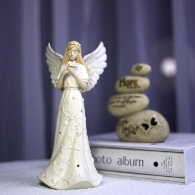 China Europe Home Decorations Polyresin Light Up Religious Angel Stage Resin Lighted Angel for sale