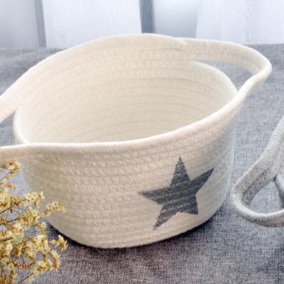 China MAISON GLOVAL Handmade Cotton Rope Woven Storage Stocked Basket with Handles for Nursery Laundry for sale