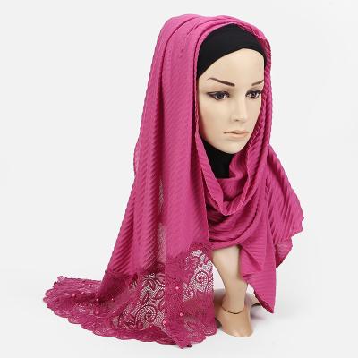 China Plain popular hot sale cotton floral solid color women scarf muslim hijab pleated lace scarves for sale