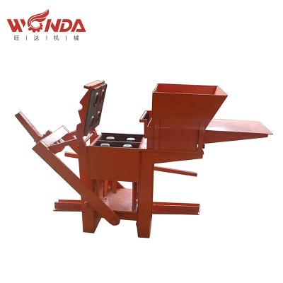 China Garment Shop Manual Dry Press Clay Soil Brick Interlocking Block Making Machine Price In Sri Lanka for sale