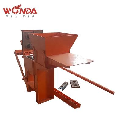 China Garment Shops new manual simple mud brick making machine second hand cheap brick making machine for sale