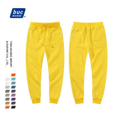 China Custom Cheap Plain Viable Logo Printed Unisex Blank Fleece Trackpants Plus Size Cargo Mens Trackpants for sale