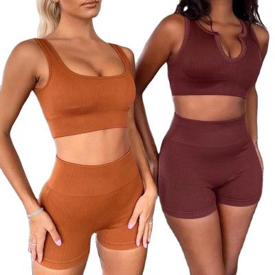 China 2022 Breathable U-Neck Fabric Ribbed Gym Fitness Sets Workout Suit Sports Bra And Yoga Shorts Two Piece Set for sale