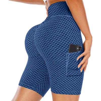 China Women Breathable Wholesale Yoga Workout Soft Shorts Plus Size Sports Gaiters With Pockets for sale