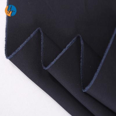 China Shaoxing keqiao yantu antistatic textile woven roll 100%cotton 315gsm plain textile for coat, suit for sale