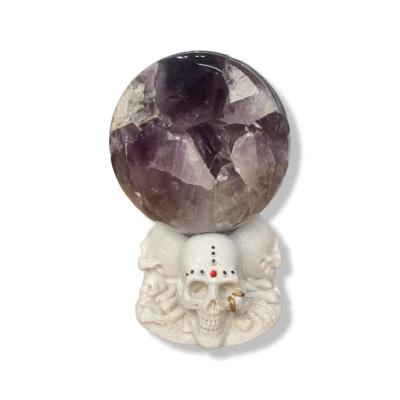 China Indoor Decoration Wholesale Resin Ghost Series Natural Skeleton Crystal Ball Based Home Decoration for sale